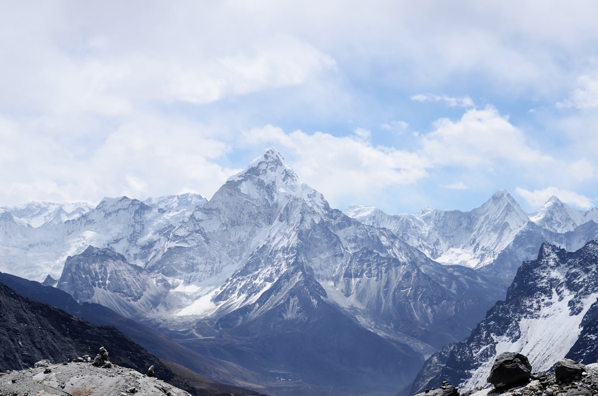 A snow-covered high-altitude mountain range